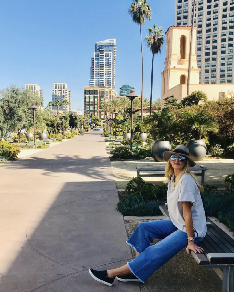 Kristi sitting on a bench outside

The Kristi Jones Podcast - Tips for Empty nester travel: A weekend in San Diego