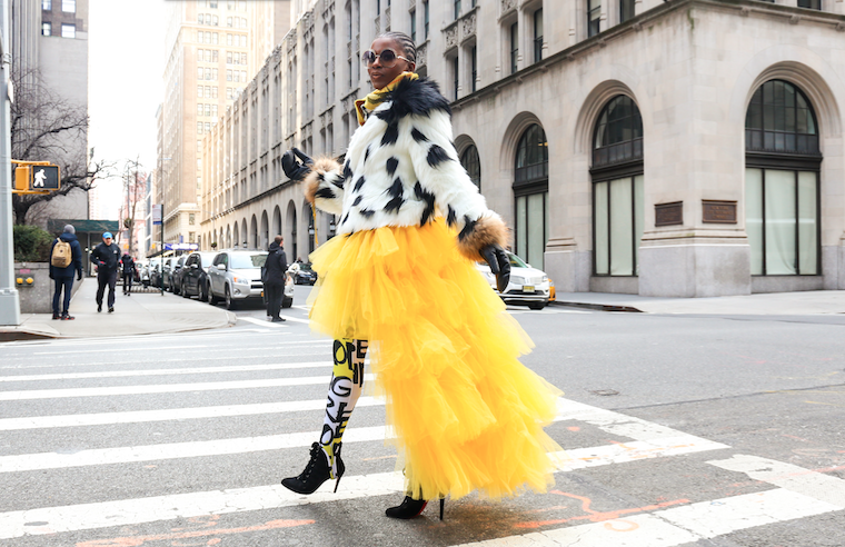 Woman dressed in a colorful outfit crosses the street

The Kristi Jones Podcast - Fitting in is overrated 