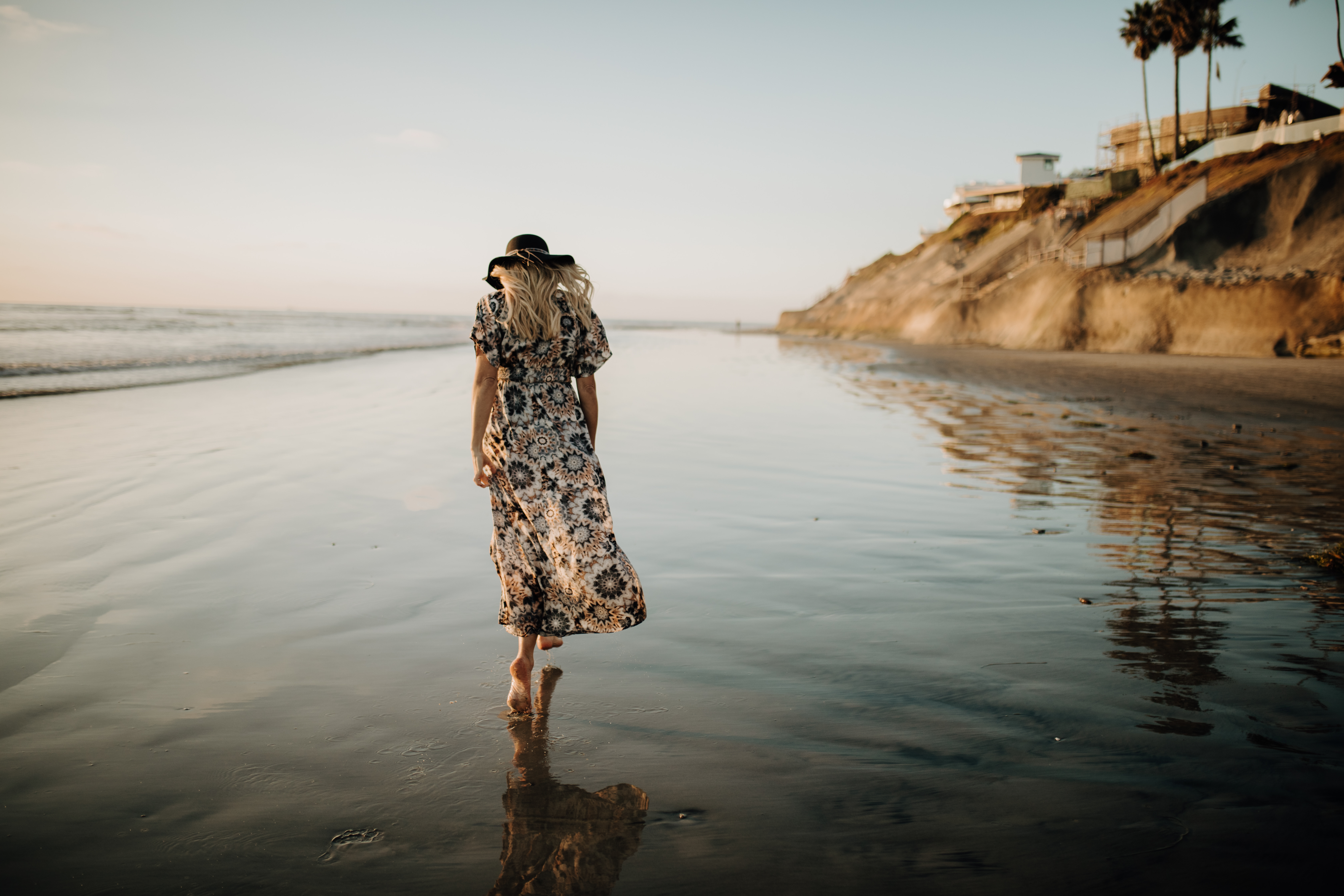 woman walk on beach