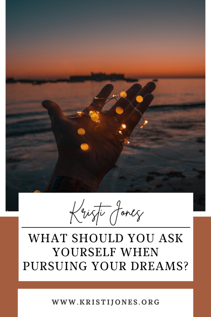 Hand opened wide with little lights on it

The Kristi Jones Podcast: What should you ask yourself when pursuing your dream?