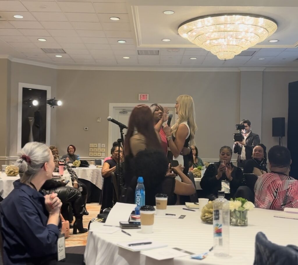 Kristi Jones standing in the middle of a room surrounded by many women

The Kristi Jones Podcast- Hey Girl stop caring what they think and start living the life you want