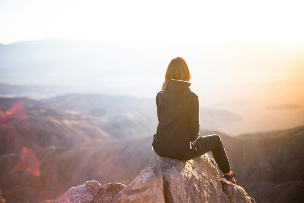 Woman sitting at the top of the mountain and looking far away

The Kristi Jones Podcast- Embracing Change and Reevaluation: Is it time for a personal reevaluation?