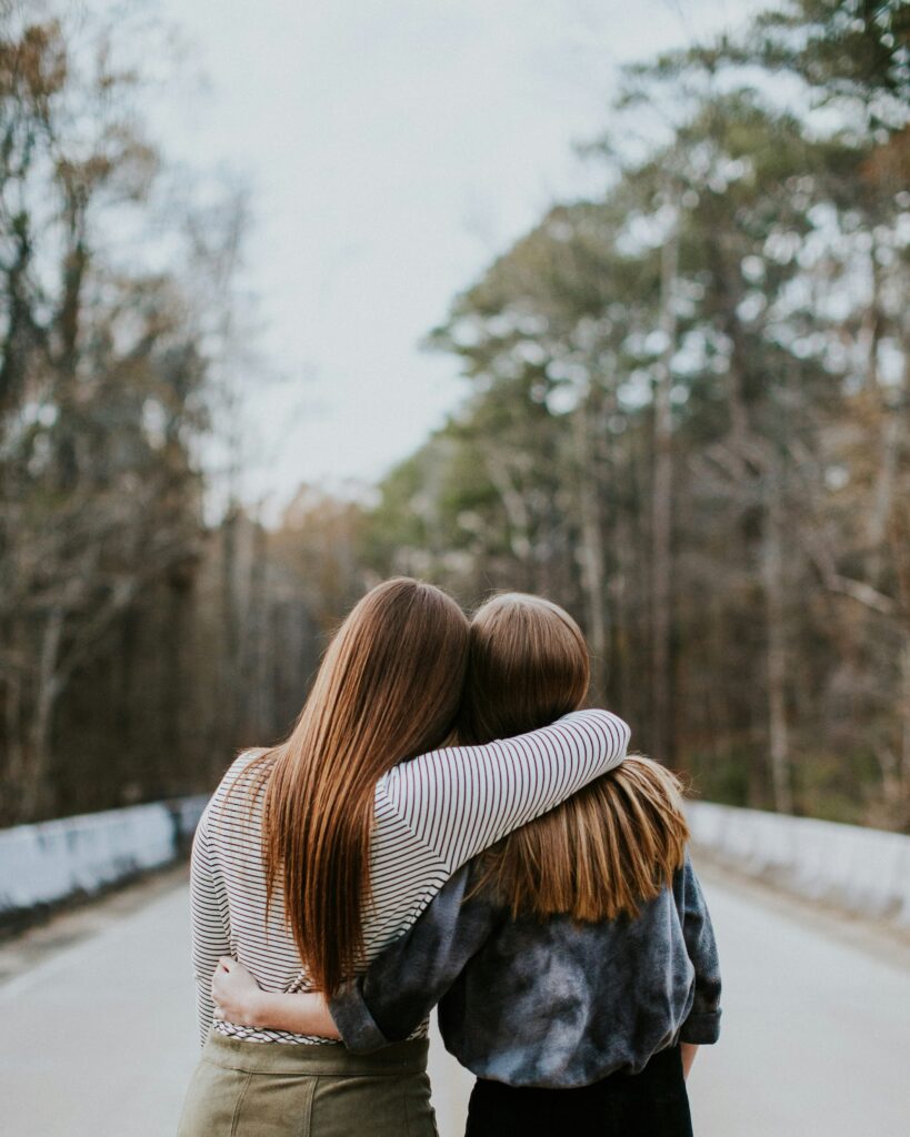 Two women in the middle of the road leaning against each other

The Kristi Jones Podcast - What's holding you back?